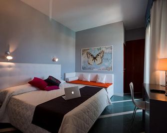 هوتل ميتروبول - سينيغاليا - غرفة نوم