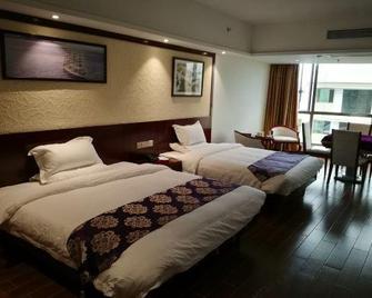 Tianfu Pearl Hotel - Lingshui - Bedroom