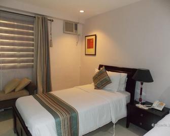 The Suites at Calle Nueva - Bacolod - Schlafzimmer