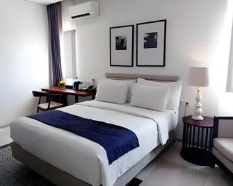 Kyriad M Hotel Sorong - Sorong - Slaapkamer