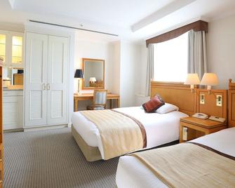 Wishton Hotel Yukari - Sakura - Slaapkamer