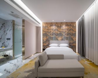 Yining Colorful Flower City Hotel (Liuxing Street Scenic Area) - Ili - Chambre