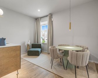 kalm stay - a design Aparthotel - Múnich - Comedor