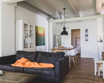 Wohnen im Denkmal Direkt am Meer - Bensersiel - Huiskamer