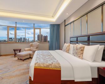 Days Hotel & Suites Shishi - Quanzhou - Bedroom