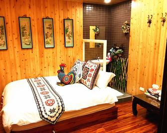 Qi Hua Zhen Ju Homestay - Toucheng Township - Bedroom