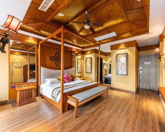 Taoran Zhixing Fashion Hotel - Huangshi - Bedroom