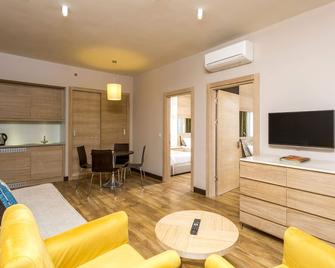 Melas Holiday Village - Side - Living room