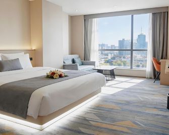 Jingyu Oriental Hotel - Liaocheng - Bedroom