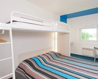 Enzo Hotels 1er Prix - Saint-Martin-sur-le-Pré - Schlafzimmer
