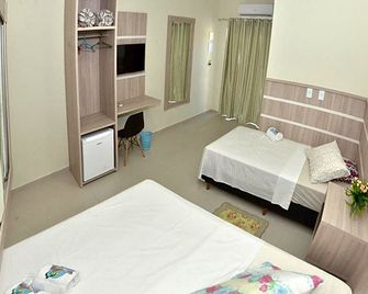 Pousada Rota dos Mares - פנייה - חדר שינה