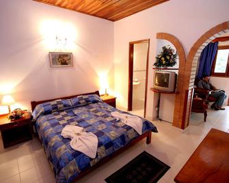 Hotel Portal del Sol - אסאנסיון - חדר שינה