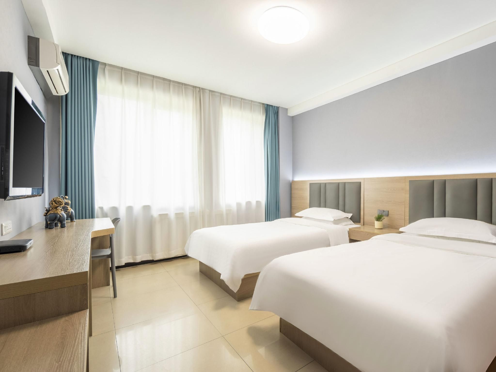 Jingyuan Collection Hotel (Fengzhou Road Wanda Plaza) - هوهيهوت - غرفة نوم