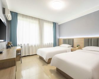 Jingyuan Collection Hotel (Fengzhou Road Wanda Plaza) - Hohhot - Bedroom