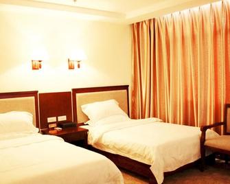 Libo Juyuan Hotel - Qiannan - Bedroom