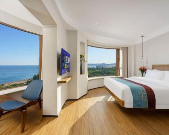 Huaneng & Cyts Holiday Hotel - Dalian - Habitación