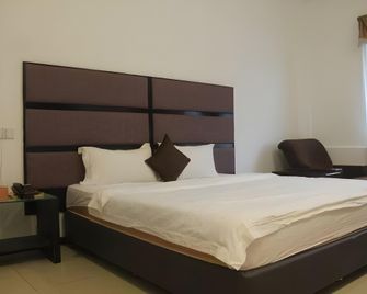 Kingston Executive Hotel - Tawau - Ložnice