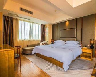 Carston Hotel - Liuzhou - Ložnice