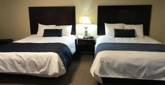 Brentwood Motor Inn - Marquette - Schlafzimmer