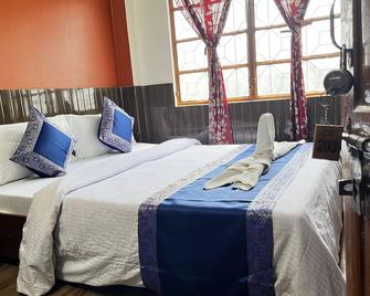 Family Guest House Varanasi - Varanasi - Bedroom