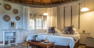 Mohlabetsi Safari Lodge - הודספרוט - חדר שינה