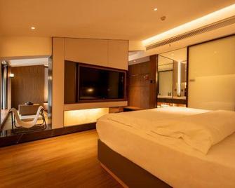 Seong nam Hotel ( Xiangyang Gucheng Branch) - Ксіанфан - Спальня