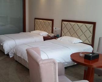 Greentree Inn Bus Station Business Hotel - Xinzhou - Спальня