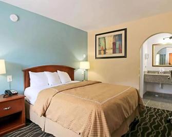 Country Garden Inn - Austin - Bedroom