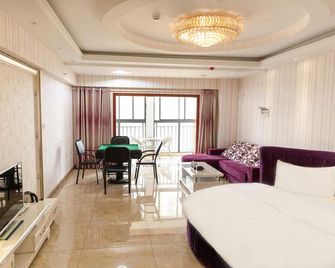 Kunming Starting Point Apartment Hotel (Tongde Kunming Square Xindu Longcheng Branch) - Kunming - Bedroom
