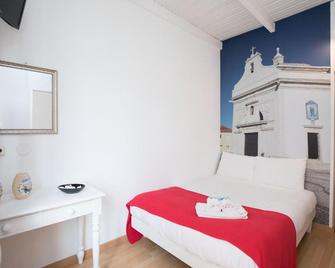 Peters Guesthouse - Aveiro - Habitación