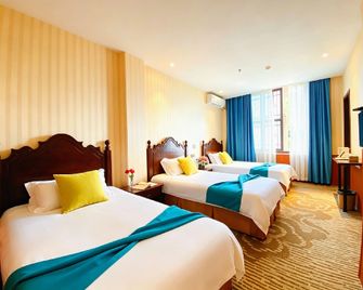 Zhaohuaxishi Inn (Taierzhuang Old Town Fuxing Plaza Store) - Zaozhuang - Schlafzimmer