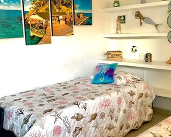 Apto en SAI a metros de la playa - DASH Vacaciones - San Andrés - Habitación