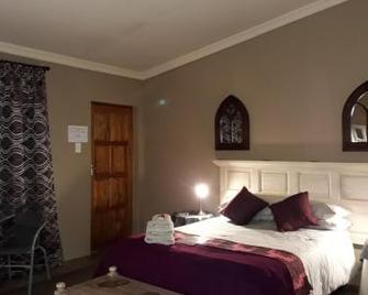 Charilo - Dullstroom - Спальня
