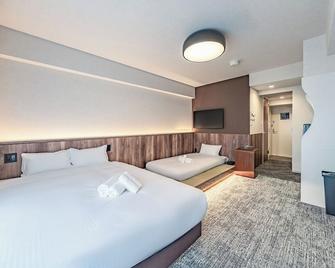 Apartment Hotel 11 Kuromon 4 - Osaka - Habitación