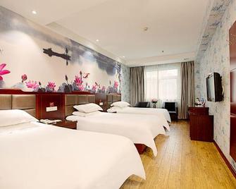 Shell Hotel (Xinxiang Pang Donglai Branch) - Xinxiang - Schlafzimmer