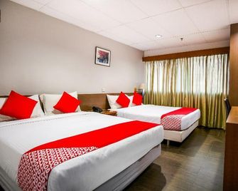 OYO 106 Beach Hotel - Singapore - Bedroom
