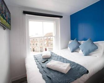 سيتي هوتل لوتون - لوتون - غرفة نوم