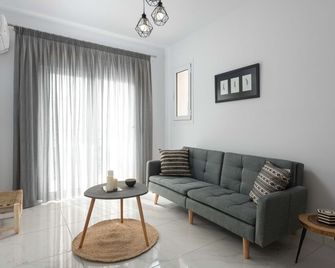 L & C Boutique Apartments - Kremasti - Sala de estar
