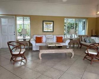 Beachfront Estate with Pool and Tropical Garden - Camps - Living room