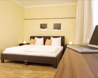 بيت الضيافة هايدلبيرغ - هيدلبرغ - غرفة نوم