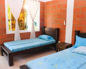 Hotel y Cabañas Costa Real - Буенавентура - Будівля