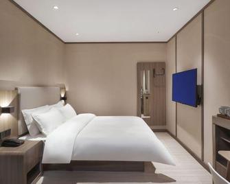 Hanting Hotel Nanjing South Railway Station Software Avenue - נאנז'ינג - חדר שינה