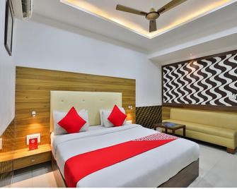 Hotel Grand Sahara Inn - Gandhinagar - Спальня
