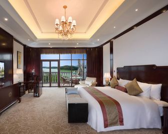 New Century Hotel Guian Guizhou - Anshun - Bedroom