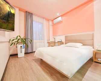 Grace Inn Hotel (Yantai South Avenue Railway Station) - Yantai - Quarto