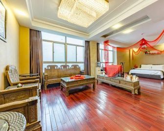 Grand Qihe Hotel - Джінан - Спальня