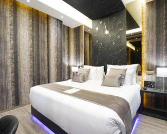 De Paris Hotel - Medan - Slaapkamer