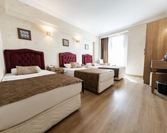 Konur Hotel - אנקרה - חדר שינה