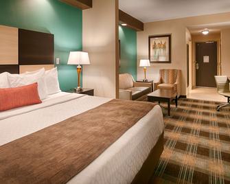 Best Western Plus Atrium Inn & Suites - Clarksville - Schlafzimmer