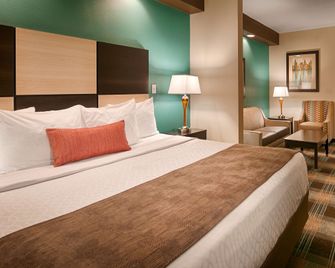 Best Western Plus Atrium Inn & Suites - Clarksville - Camera da letto
